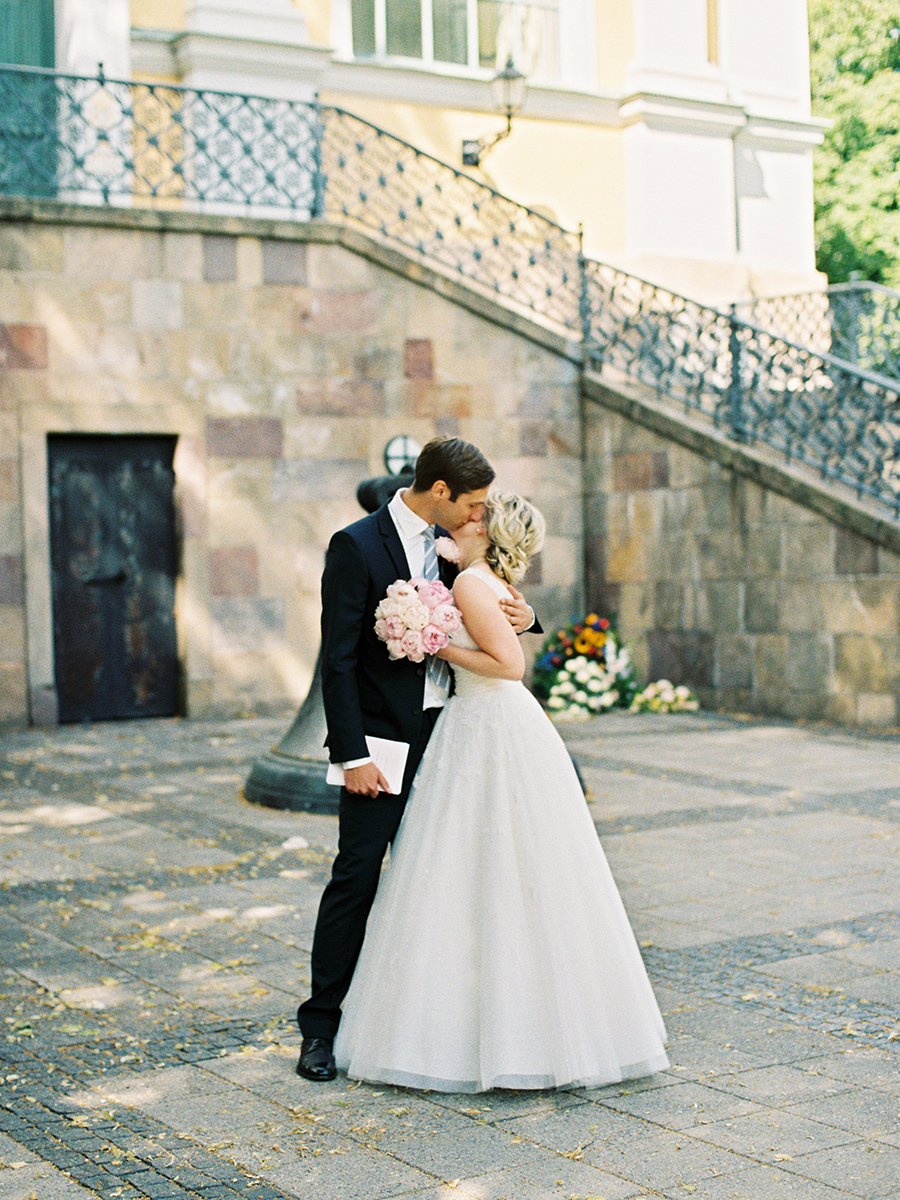 bride and groom outside church