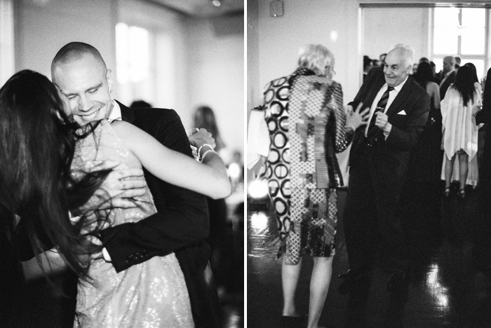 Wedding guests dancing in black and white