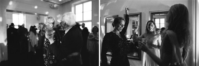 Wedding guests dancing in black and white