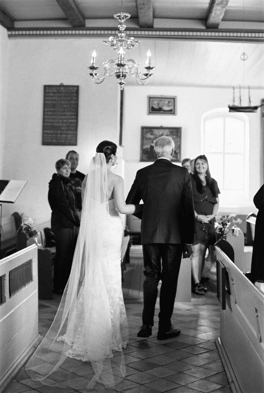Bride walking down the ailse with her father
