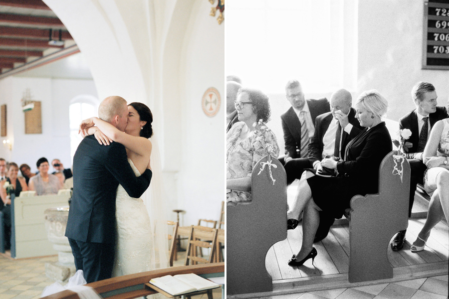 Bride and groom's first kiss during wedding ceremony