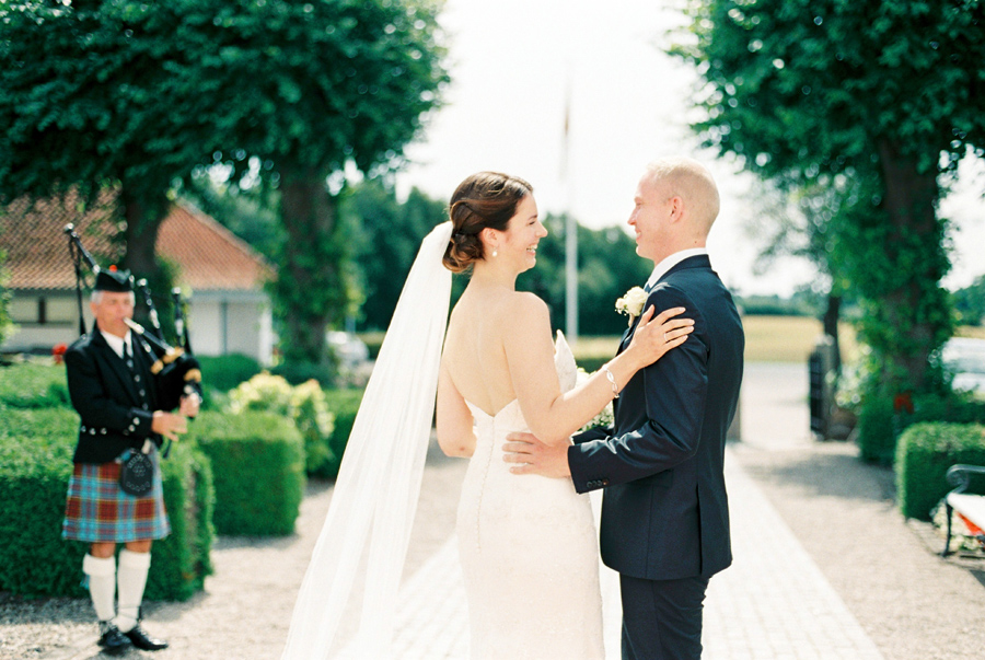 Bride and groom outdoors after wedding ceremony in Denmark