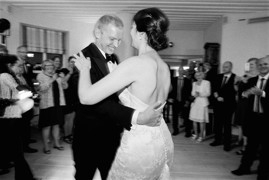 Bride and grooms first dance black and white film photograph