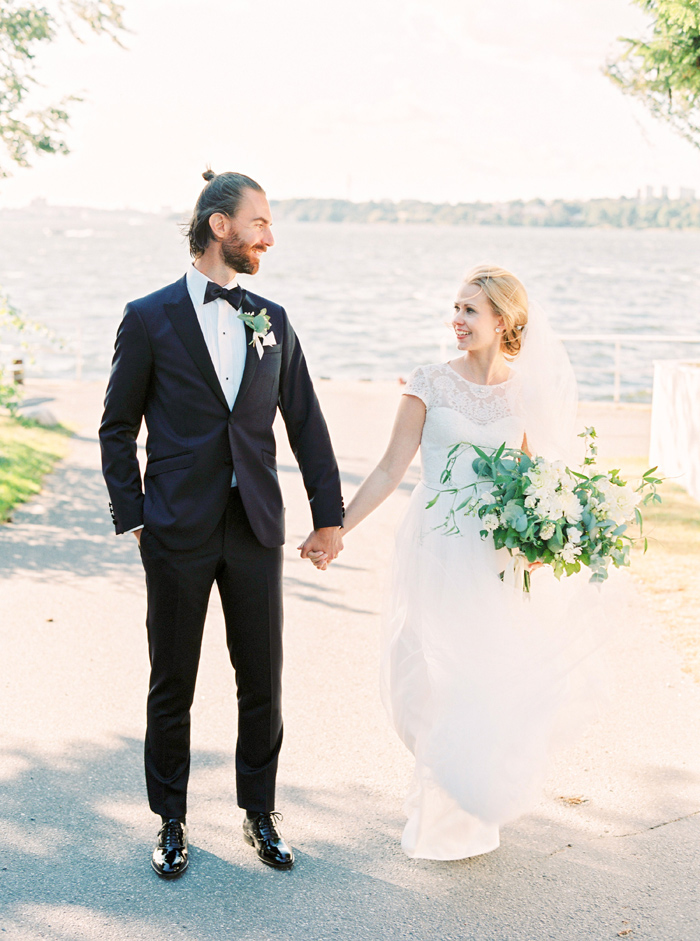 Bride and groom by the water at Ekensdal Stockholm Wedding