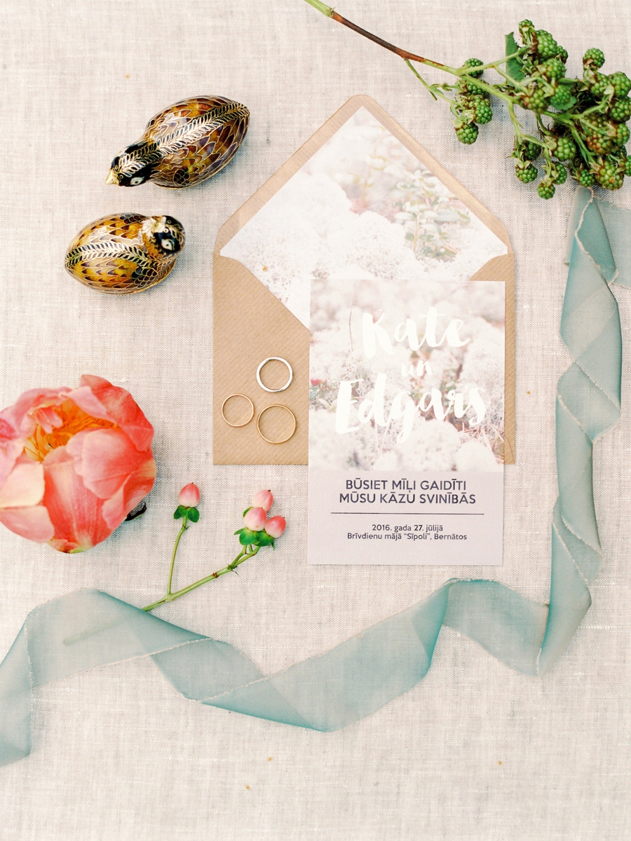Wedding invitations in soft pastel hues designed by the bride