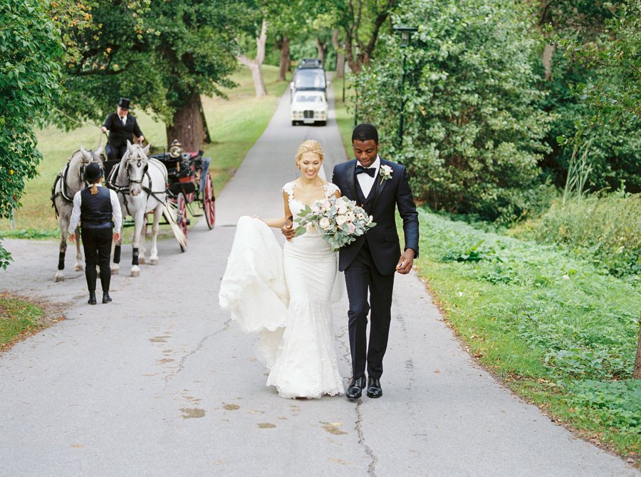 Bride and groom walking at Djurgården