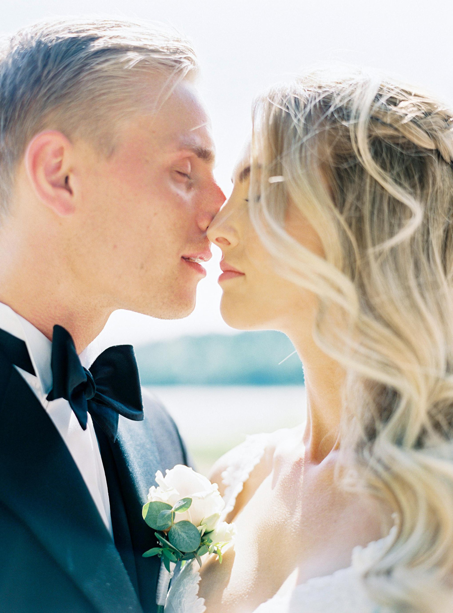 Closeup of grooms bow-tie on black.tie wedding in Sweden