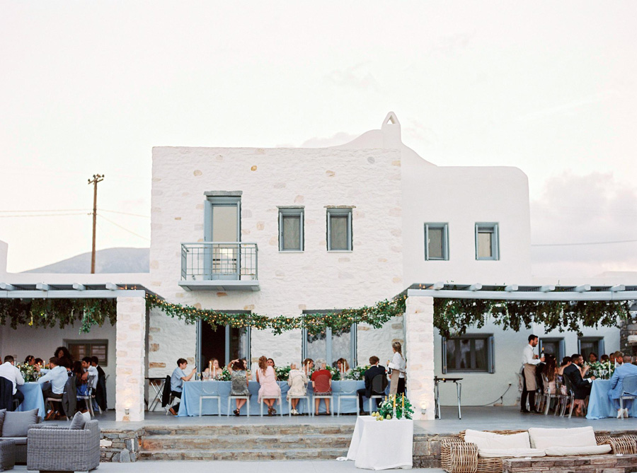Outdoor wedding reception by the pool side at Aelia Villas Paron