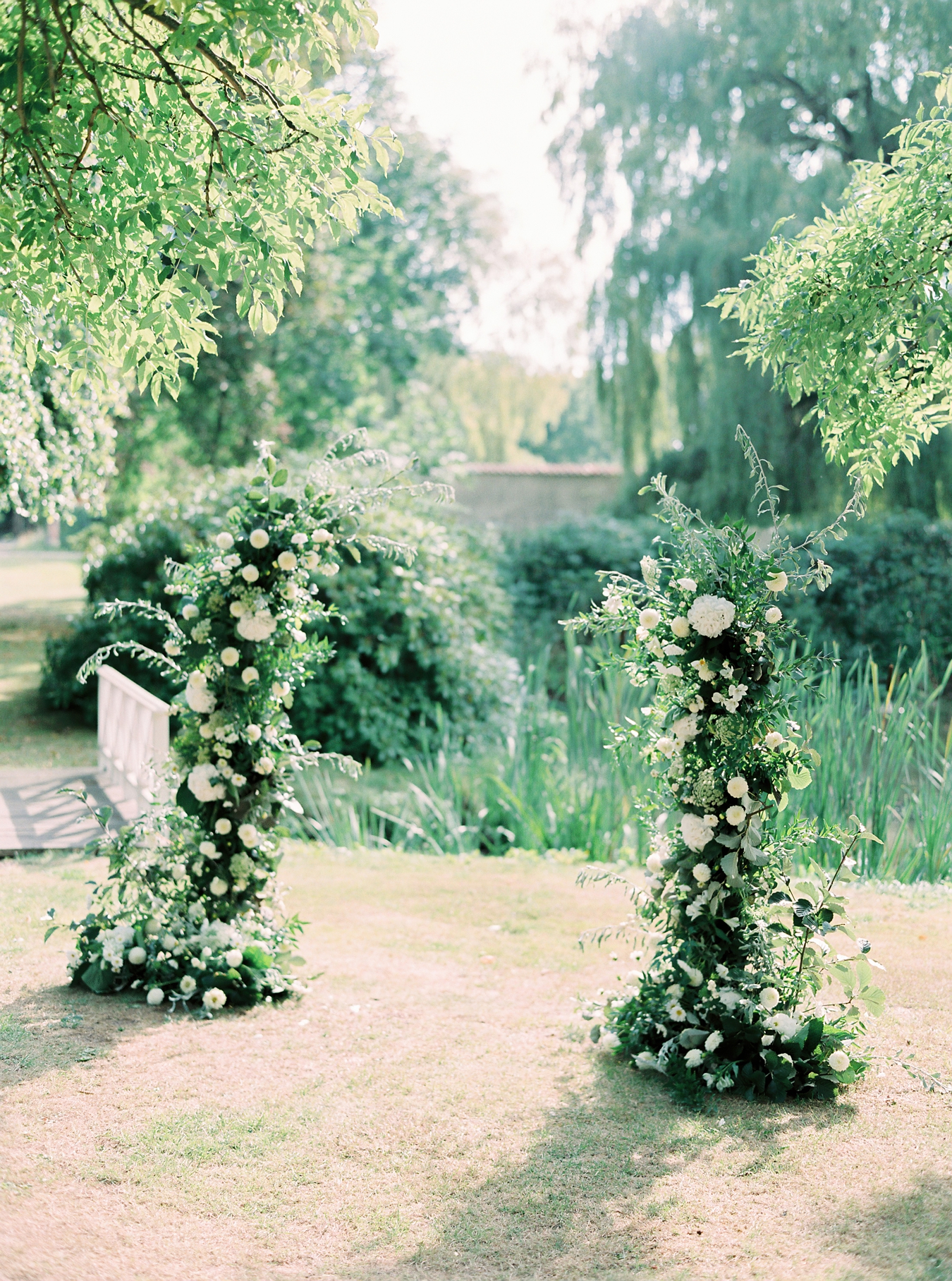 White and green flower arch in the garden of Jordberga Skåne